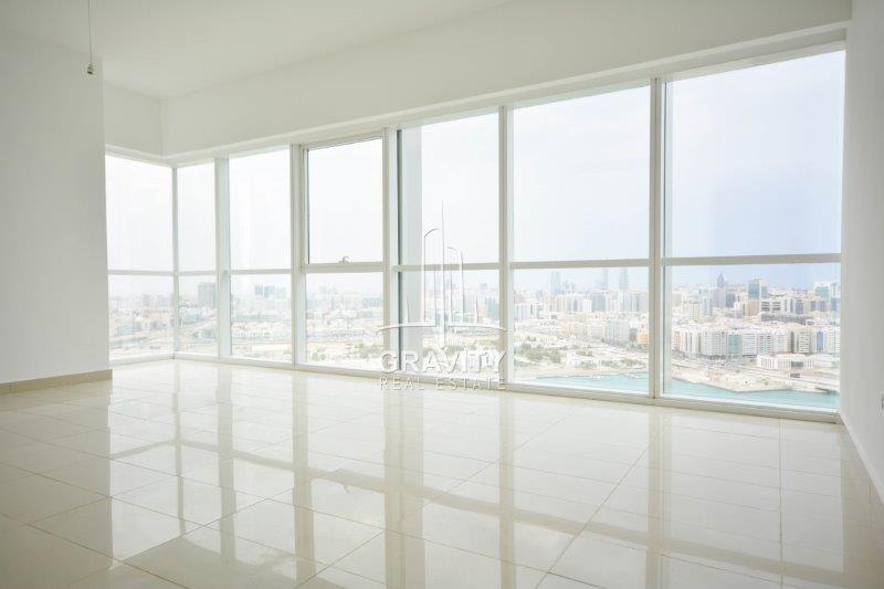 amazing-living-area-with-clean-glass-windows-covering-the-whole-wall-for-better-view--in-mag-5-reem-island