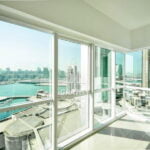 amazing-view-of-the-sea-and-the-community-through-the-huge-window-wall-in-mag-5-residences-min