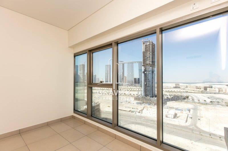 astonishing-view-of-community-throgh-glass-wall-in-a-2-Bedroom-apartment-in-the-wave-tower-reem-island