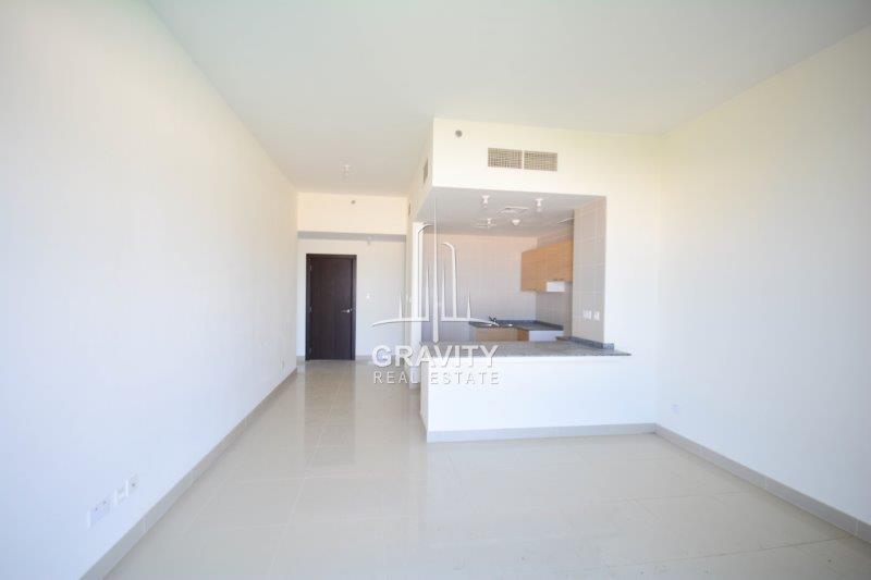 bar-style-open-kitchen-in-hallway-of-2br-apt-in-marina-bay-2-reem-island