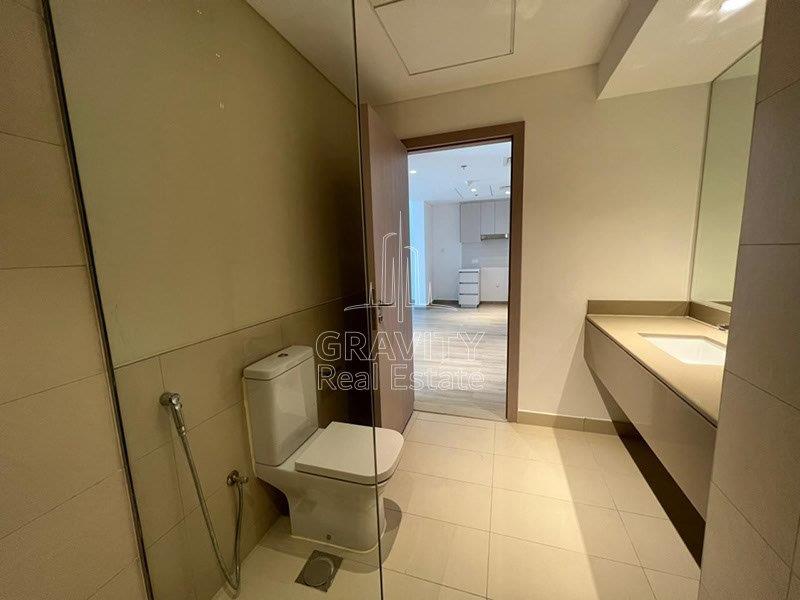 bathroom-with-ceramic-tiles-and-shower-room-in-yas-island-waters-edge