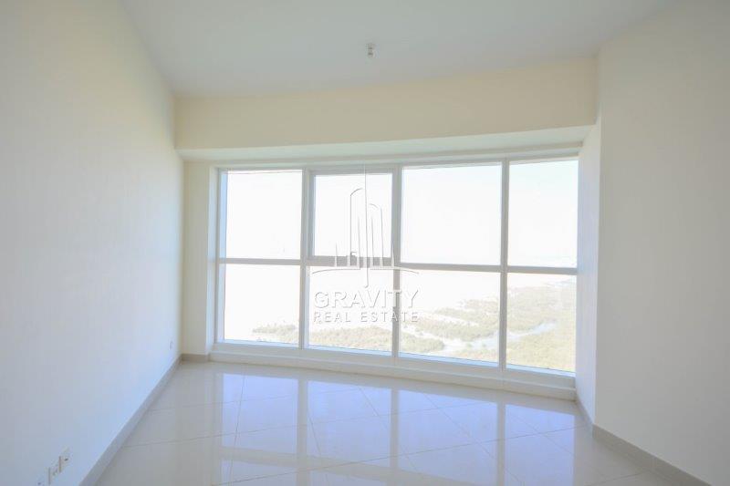 bedroom-2-with-window-panel-and-shining-floor-tiles-marina-bay-2-reem-island