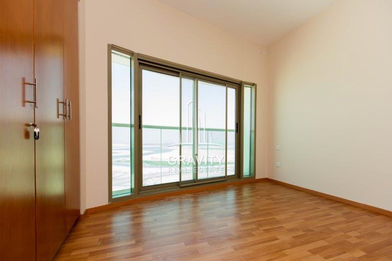 builtin-wardrobe-and-huge-window-panel-in-living-room-area--in-beach-tower-reem-island