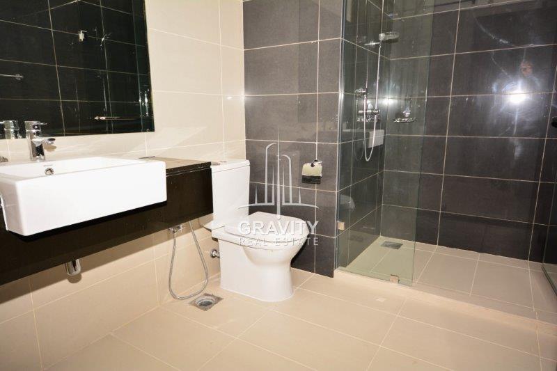 clean-washrrom-with-covered-shower--in-mag-5-reem-island