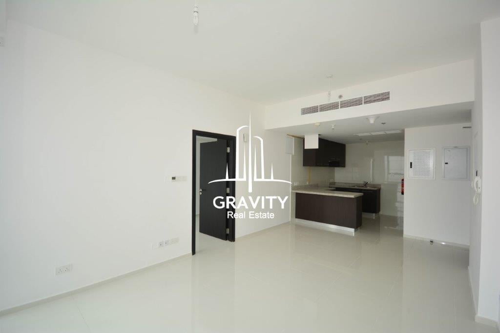 cozy-hall-area-with-the-entrance-door-for-the-room-besides-the-clean-open-kitchen-horizon-tower-reem-island