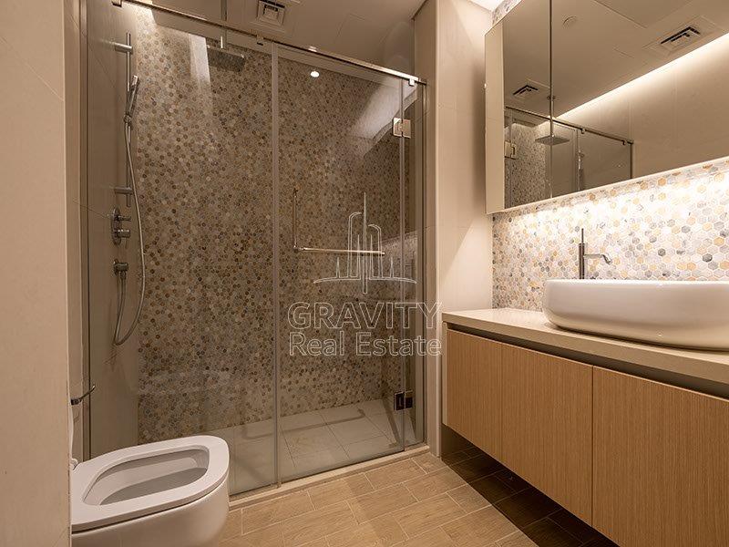 cozy-washroom-with-nicely-designed-floors-and-walls-to-give-nice-feel-to-it--in-mayan-apartments