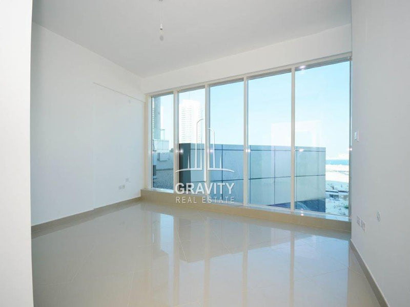 divine-bedroom-area-with-whole-one-side-covrerd-by-window-overlooking-view-oceanscape-reem-island