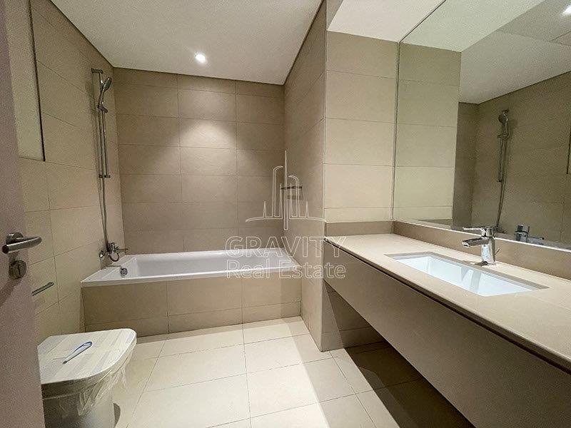 huge-batroom-w-bathroom-long-marble-counter-sink-in-waters-edge-yas-island-abu-dhabi-apartment-for-rent