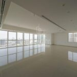 large-and-spacious-living-room-area-with-ac-vents-running-on-roof-and-big-window-panel-covering-the-wall-mag-5-reem-island