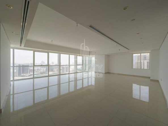 large-and-spacious-living-room-area-with-ac-vents-running-on-roof-and-big-window-panel-covering-the-wall-mag-5-reem-island