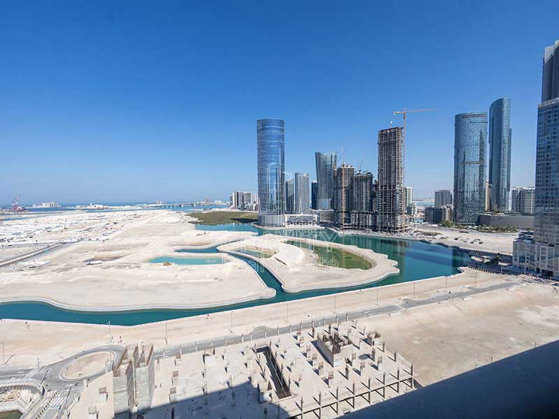 large-balcony-with-mesmerizing-view-of-the-canal-and-reem-island-in-1-bedroom-apartment-in-julphar-residence