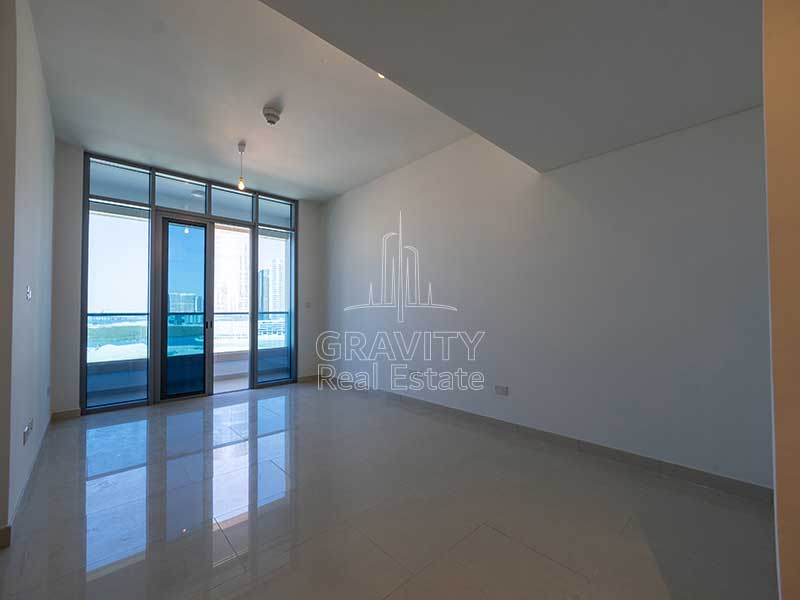 living-area-with-white-ceramic-tiles-in-studio-apartment-in-julphar-residence-abu-dhabi