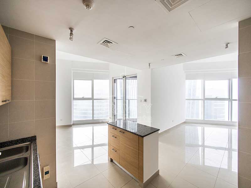 living-room-with-open-kitchen-in-2-bedroom-apartment-sigma-1-tower