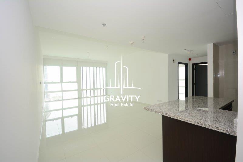 livingroom-w-open-kitchen-in-a-2-bedroom-apartment-in-horizon-towers-A-for-sale