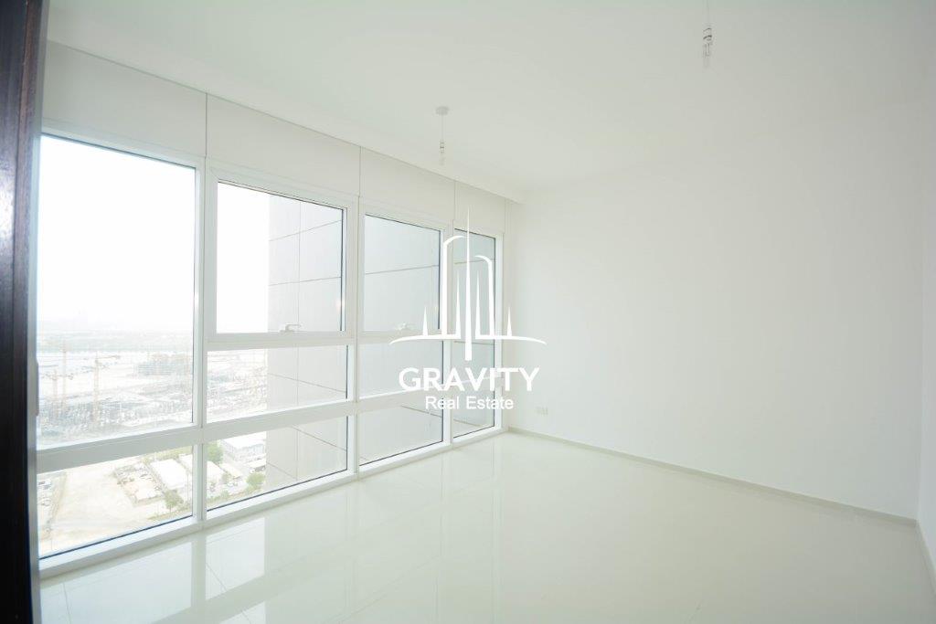 marvelous-living-room-area-and-the-walls-are-painted-white-and--white-tiles-and-large-window-horizon-tower-reem-island