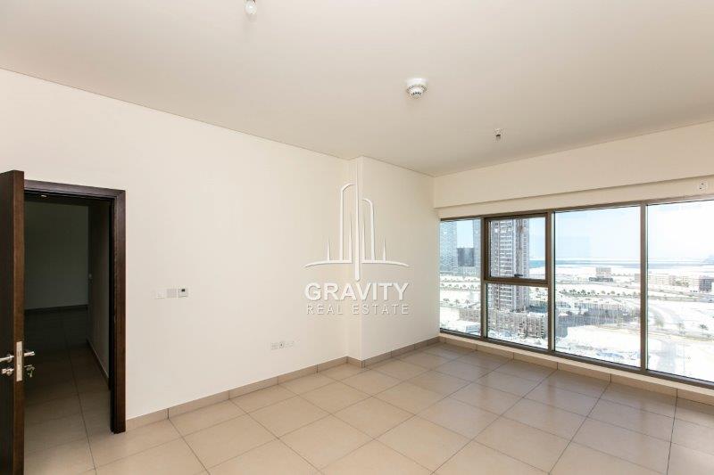 master-bedroom-w-amazinf-view-from-glass-wall-in-a-2-Bedroom-apartment-in-the-wave-tower-reem-island