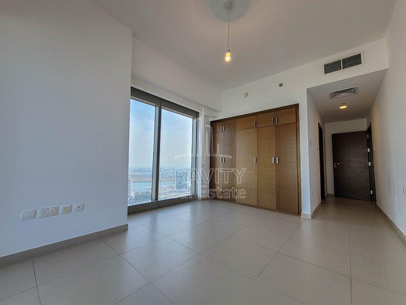 master-bedroom-with-amazing-view-on-glass-wall-of-a-3-BR-apartment-in-gate-towers-reem-island