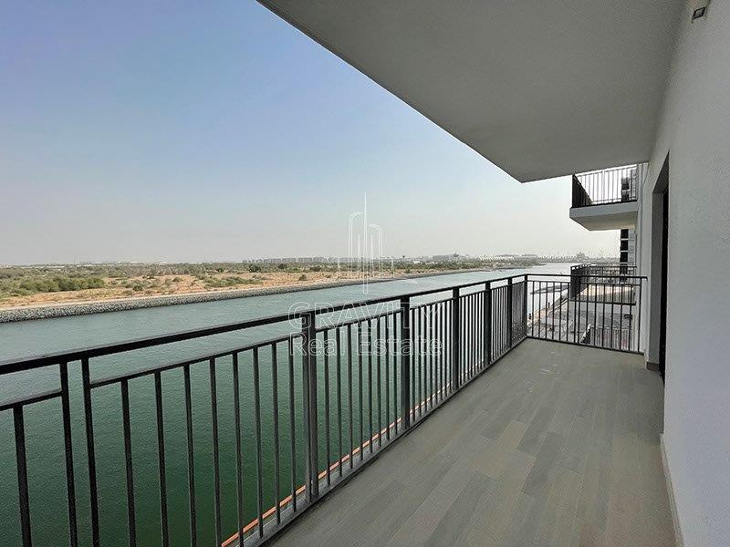 mesmerizing-view-of-water-on-a-huge-balcony-in-waters-edge-yas-island-abu-dhabi-apartment-for-rent