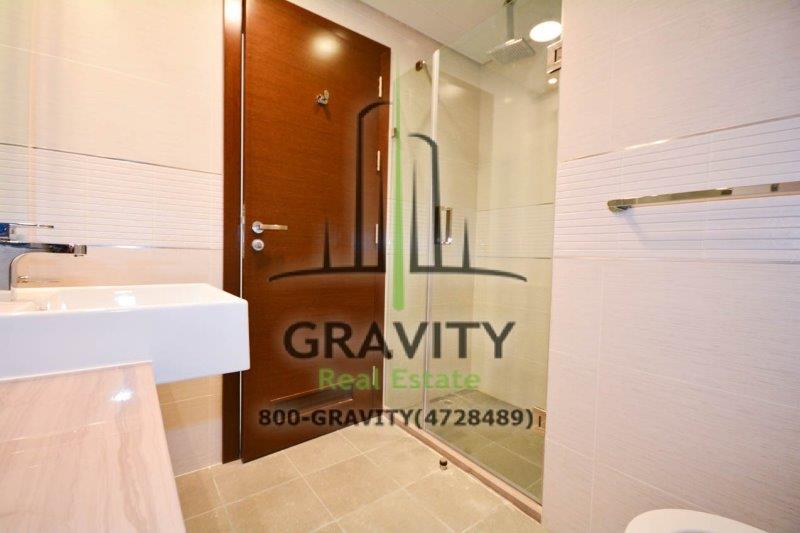 nice-bathroom-with-shower-area-in-studio-apartment-in-arc-tower-c