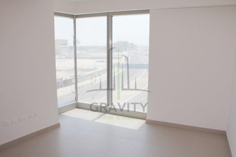 nice-glass-wall-wind0w-in-a-studio-apartment-for-rent-in-the-arc-tower-al-reem-island