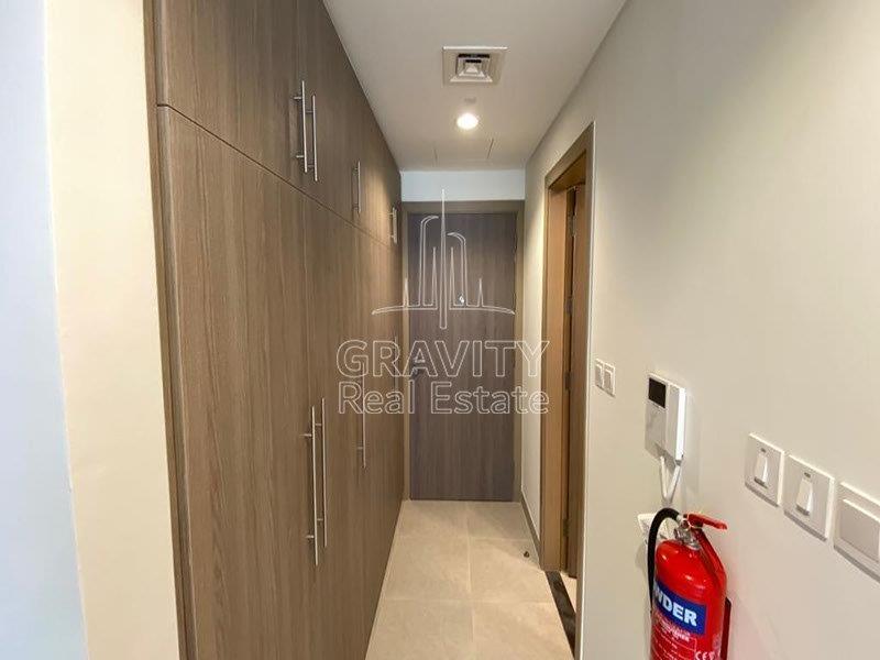 nicely-fitted-built-in-wardrobe-and-mounted-fire-extinguisher-in-soho-square-apartments