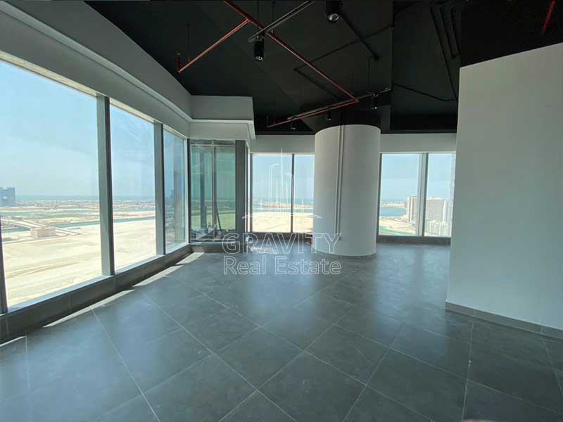 office-in-addax-tower-reem-island-with-dark-tiles-and-large-white-pillar