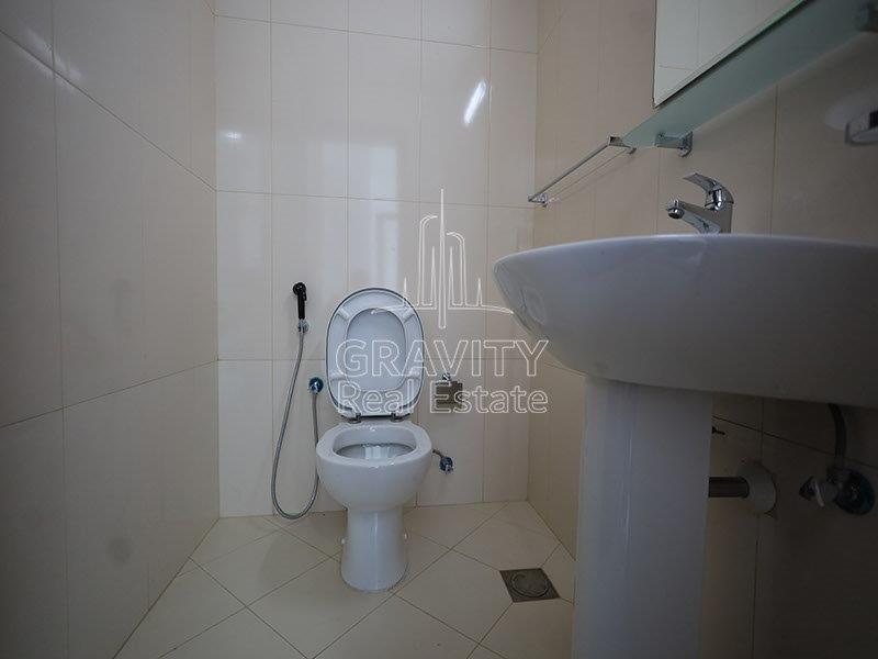 powder-room-with-toilet-and-sink-in-1-bedroom-apartment-in-hydra-avenue-tower-c5