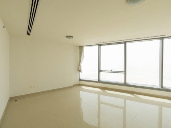 spacious-living-room-of-1-bedroom-apartment-in-sky-tower-al-reem