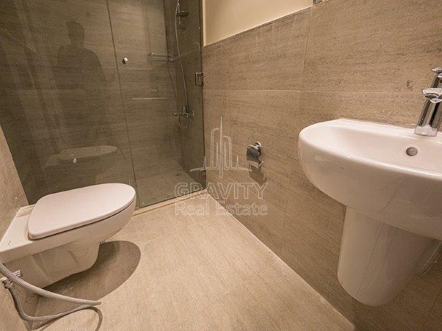 squeaky-clean-washroom-with-covered-shower-area-with-glass-panels-oasis-1