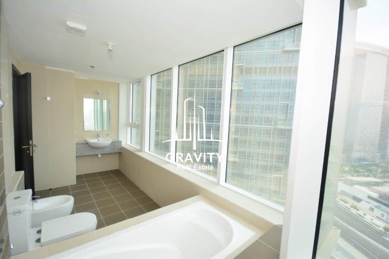 stunning-bathrrom-with-bathtub-facing-a-glass-wall-and-amazing-view-in-a-2-bedroom-apartment-in-horizon-towers-A-for-sale