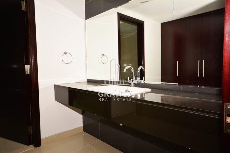 washroom-sink-with-attached-big-mirror-on-wall-in-mag-5-reem-island