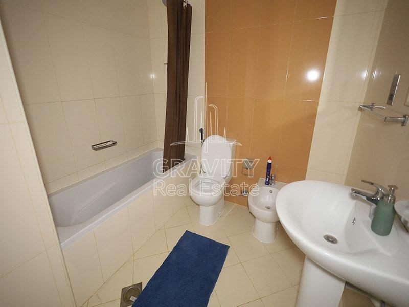 well-lit-bathroom-studio-of-apartment-in-hydra-c6-tower-with-bathtub-toilet-and-bidet