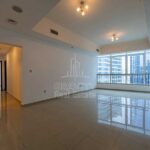 wide-open-living-room-with-blue-tinted-windows-in-excellent-2-bedroom-apartment-in-hydra-c6