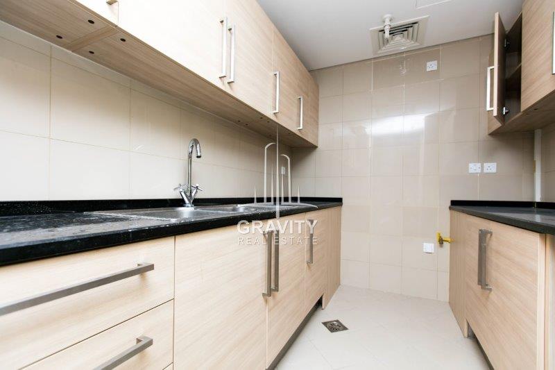 wooden-touched-clean-kitchen-area-rak-tower