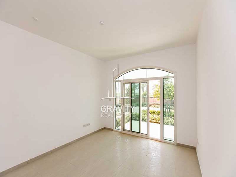 al-ghadeer-abu-dhabi-property-living-room-view-from-back-with-balcony