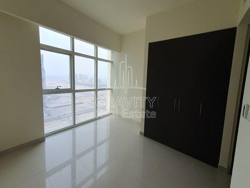 amazing-bedroom-aea-with-built-in-wardrobes-and-big-window-panel-tala-tower-reem-island