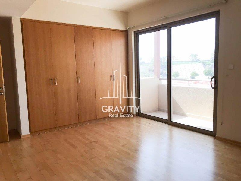 amzing-bedroom-w-wooden-floors-and-built-in-cabinets-of-a-3-bedroom-townhouse-in-sidra-community-raha-gardens-for-sale