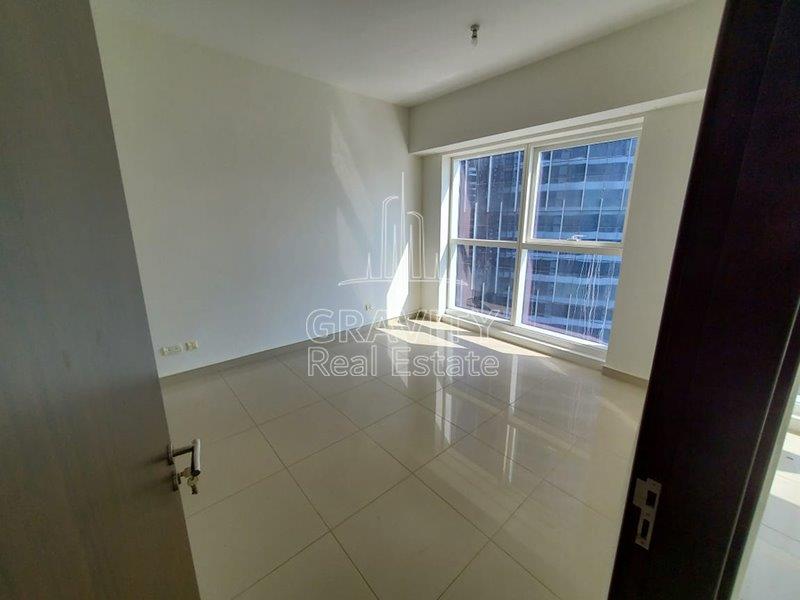 amzingly-cozy-bedroom-w-huge-glass-window-of-a-1-bedroom-apartment-in-marina-bay-c2-for-sale-in-reem-island