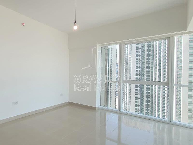 bedroom-area-with-bright-white-tiles-and-walls-with-window-panel--mag-5-b2-tower