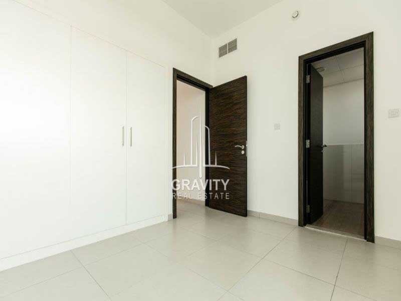 cozy-bedroom-w-built-in-wardrobes-of-a-1-bedroom-apartment-in-al-ghadeer-2-for-sale