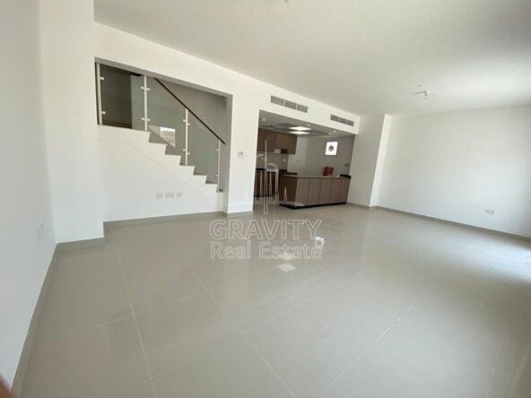 huge-living-hall-area-with-open-kitchen-and-stairs-for-the-second-floor--al-reef-2