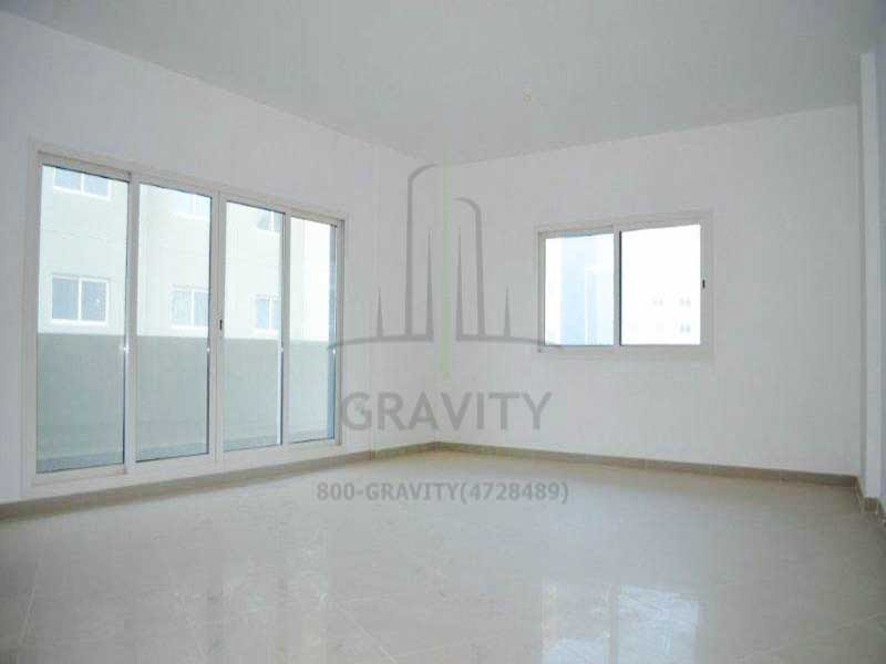 huge-living-hall-area-wtih-glass-windows-ad-bright-walls-in-downtown-al-reef