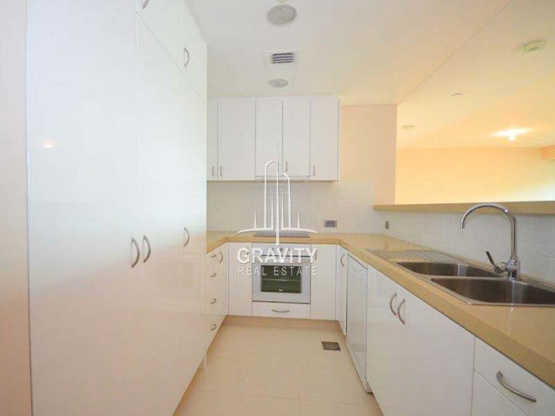 kitchen-of-a-2-bedroom-apartment-in-al-nada-raha-beach-for-sale