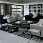 magnificent-other-hall-area-with-black-and-white-themed-furnitures-and-decors-al-gurm-resort