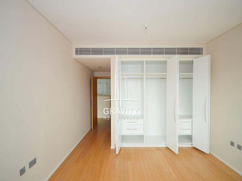 master-bedroom-w-built-in-cabinets-of-a-2-bedroom-apartment-in-al-maha-1-raha-beach-for-sale