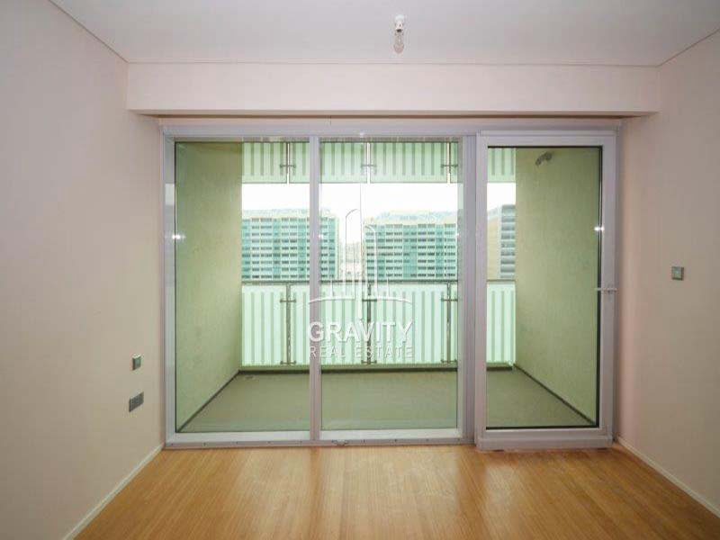 nice-glass-slidding-door-directed-to-balcony-of-a-2-bedroom-apartment-in-al-maha-1-raha-beach-for-sale