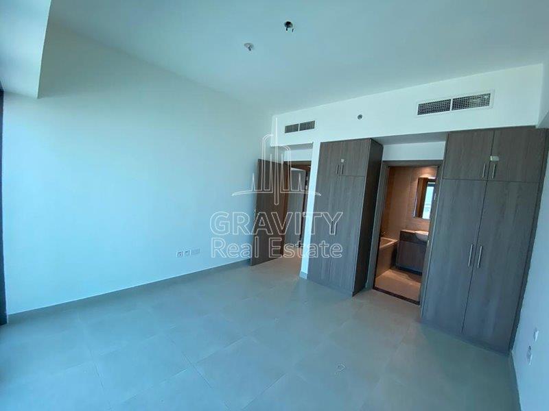 nice-wooden-built-in-cabinets-on-the-master-bedroom-of-a-2-bedroom-apartment-in-park-view-saadiyat-for-rent