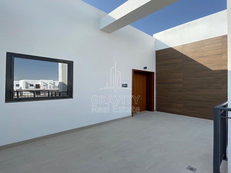 open-veranda-of-a-2-bedroom-apartment-in-al-ghadeer-for-sale