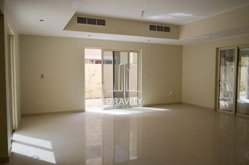 spacious-and-cozy-living-area-w-natural-lighting-of-a-3-bedroom-villa-in-al-raha-gardens-for-rent