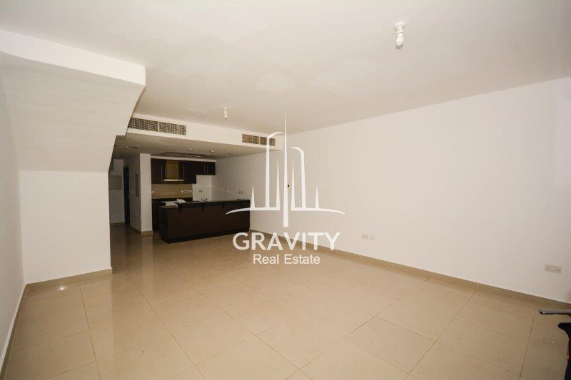 spacious-living-area-of-a-3-bedroom-villa-in-desert-village-al-reef